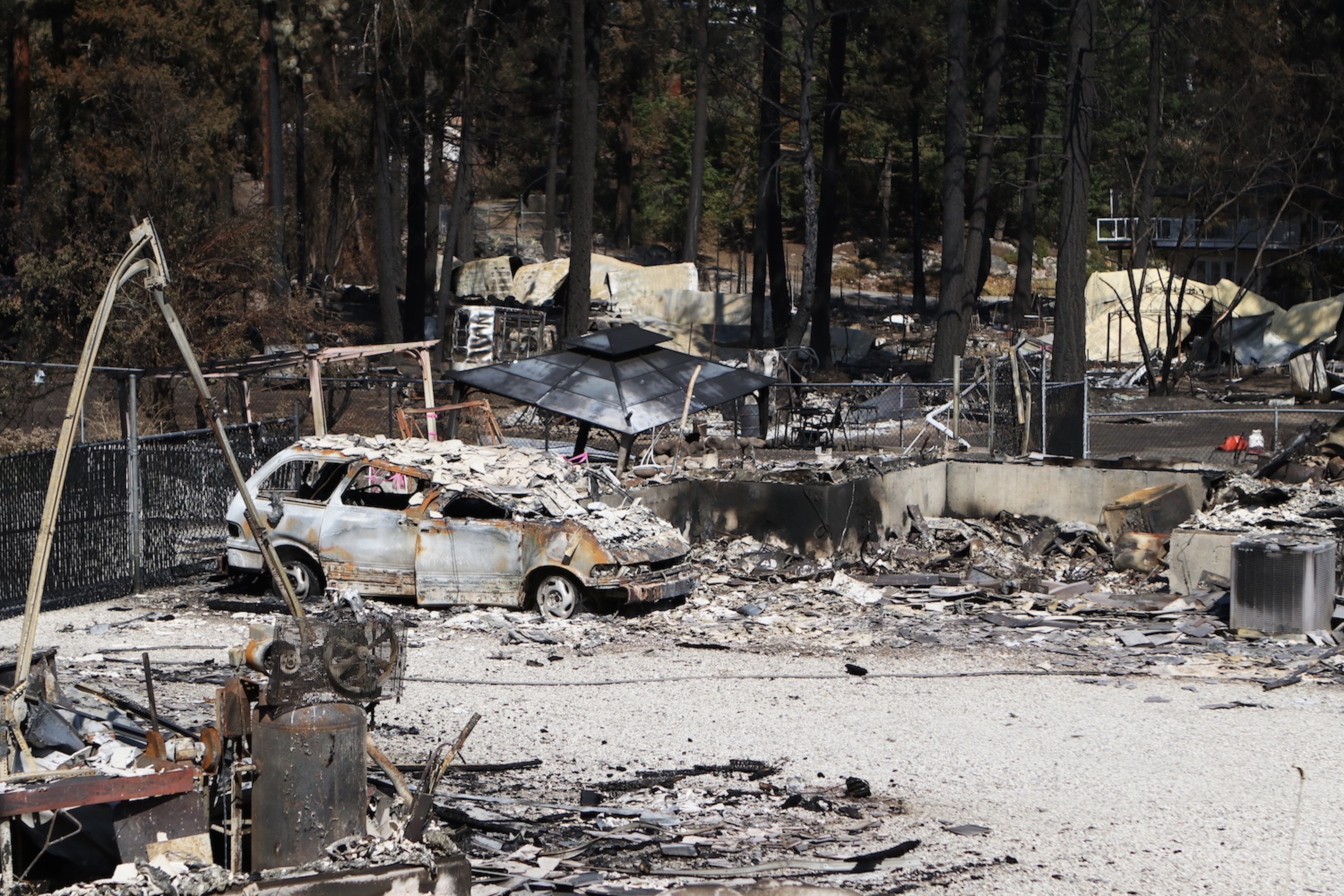 A wildfire-damaged Killiney Beach property near Kelowna, B.C., on Aug. 24, 2021. The property is located in one of the Westside Road neighbourhoods that was impacted by the White Rock Lake Wildfire, which burned a total of 83,342 hectares that summer. (Aaron Hemens for Kelowna Capital News)